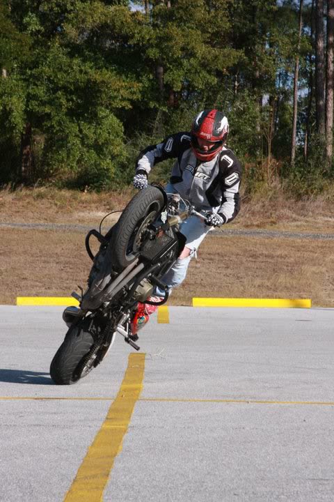 Rider doing a stoppie on the F4i